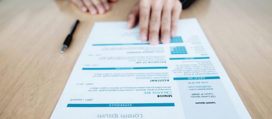 Businessman and resume.Job search and job interview concept idea.